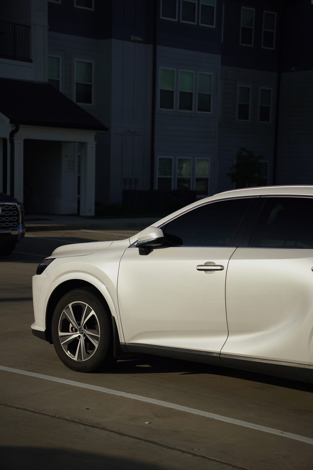Close-up of professionally tinted window on Lexus SUV